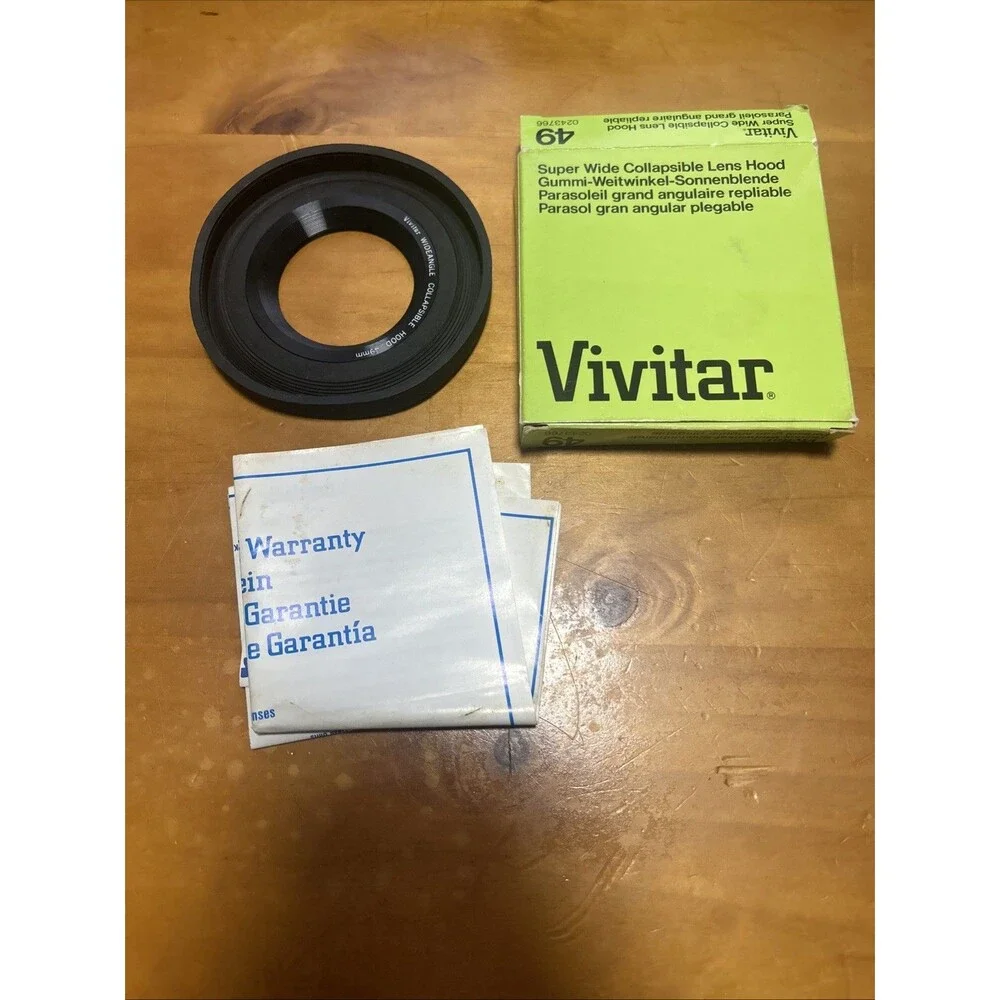 Vivitar super wide angle collapsible lens hood. 49mm thread. New
